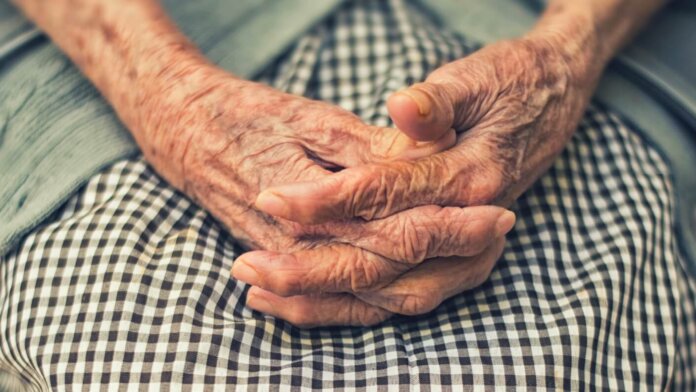 longevity genetics old hands black and white dress